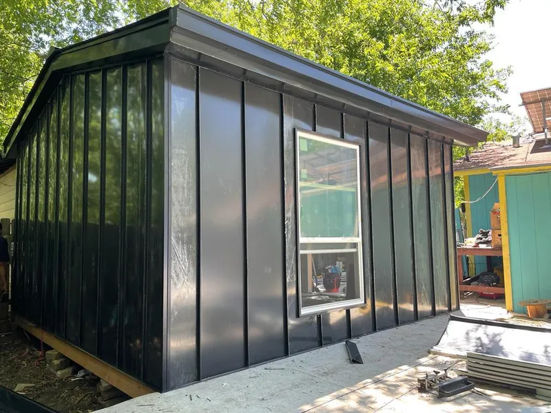 Black standing seam metal wall panels for Roof Inspection in Joshua Tree
